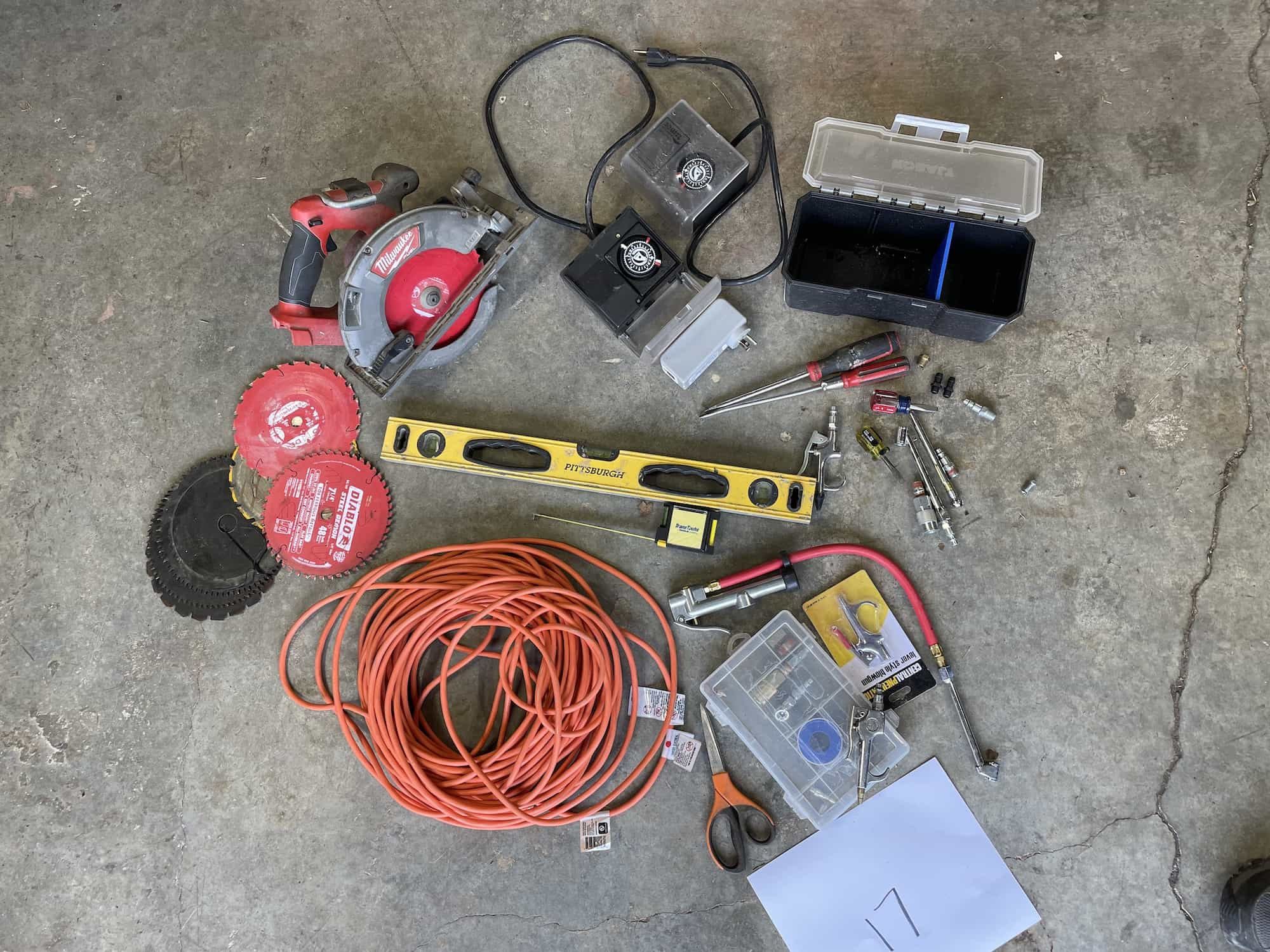 $50 - Tools GRAB BAG #17 : Milwaukee portable circular saw, blades, 100ft extension cord, outdoor AC timers +more