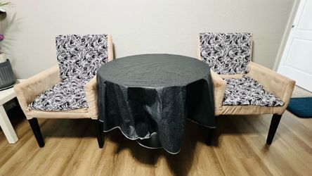 Round table with two chairs