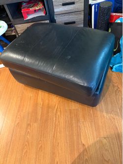 Leather Ottoman that opens for storage