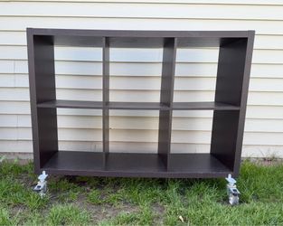Brown Wooden Cube Shelf On Wheels