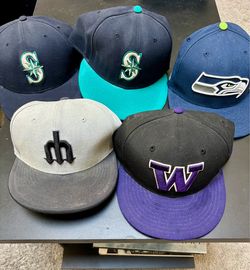 Various sports hats and trucker hats