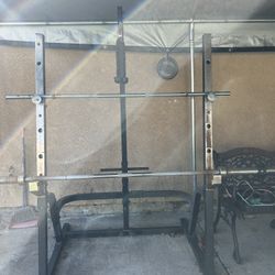 Squat Rack And 2 Bars