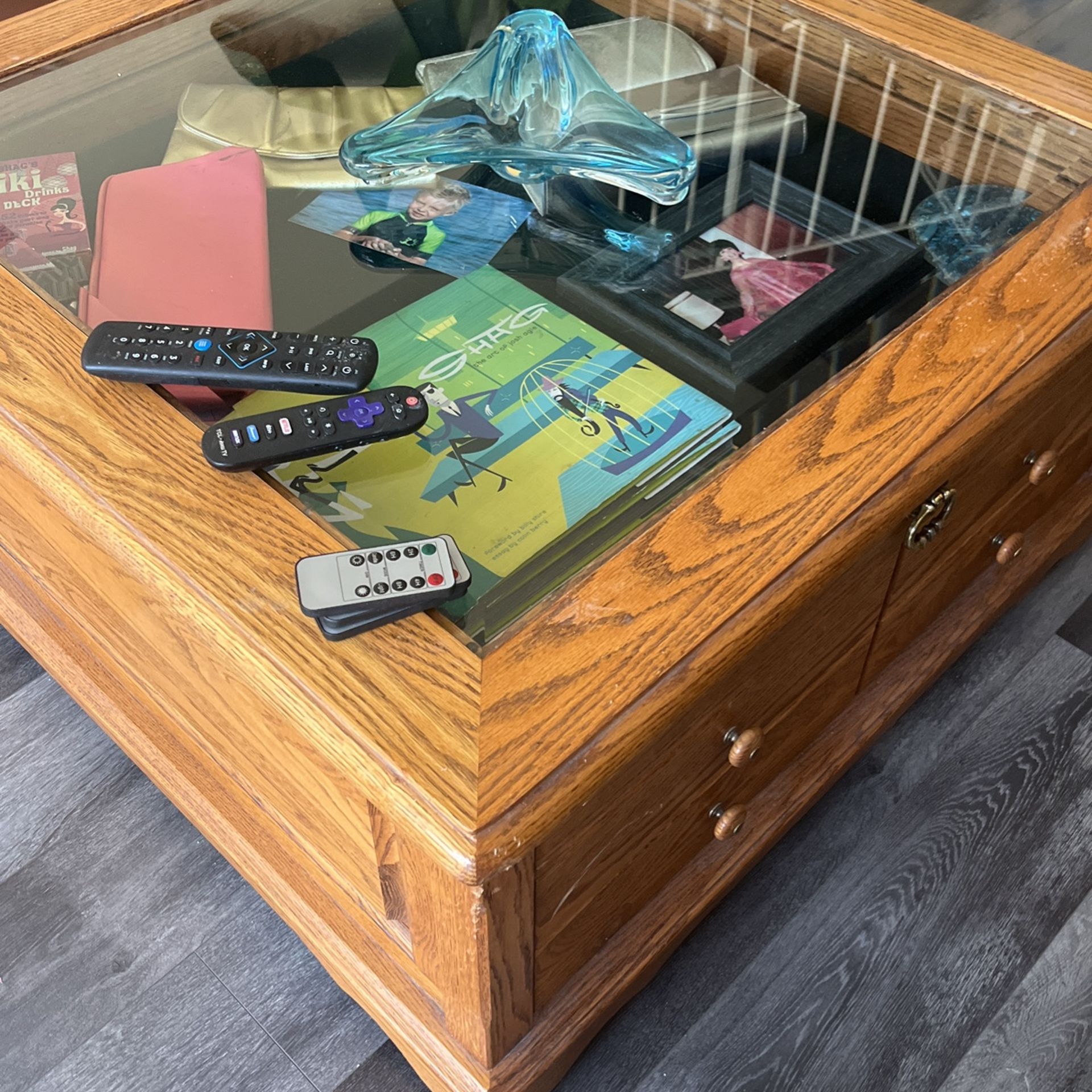 Walnut Rolling Coffee Table. The Drawer works magnificent for different displays.