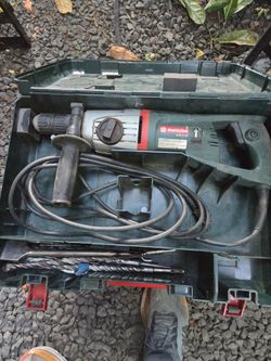 Rotary hammer drill with extras