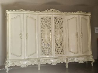 Giant Armoire Dresser Cabinet With Center Mirrored Doors.