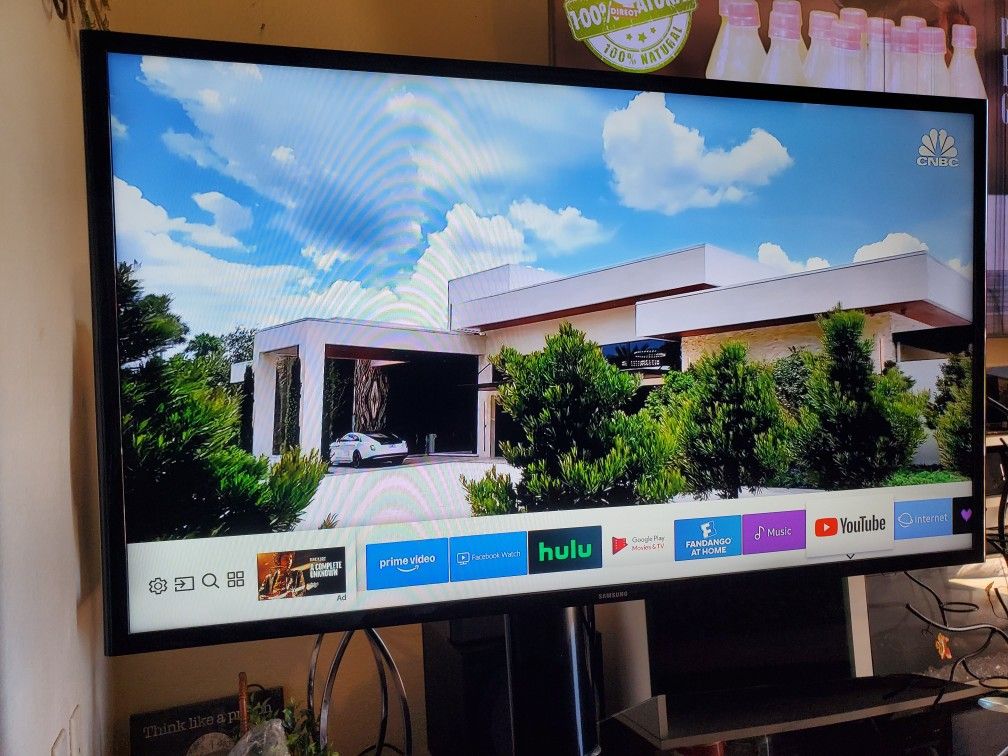 42" Samsung smart tv 4k with tv stand mounted shelves glasses. Selling together they are excellent condition. Tv has great quality pics no scratch