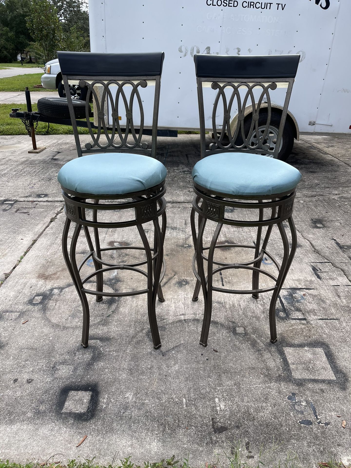 2- Bar Height Gray Rought Iron Swivel Bar Stools