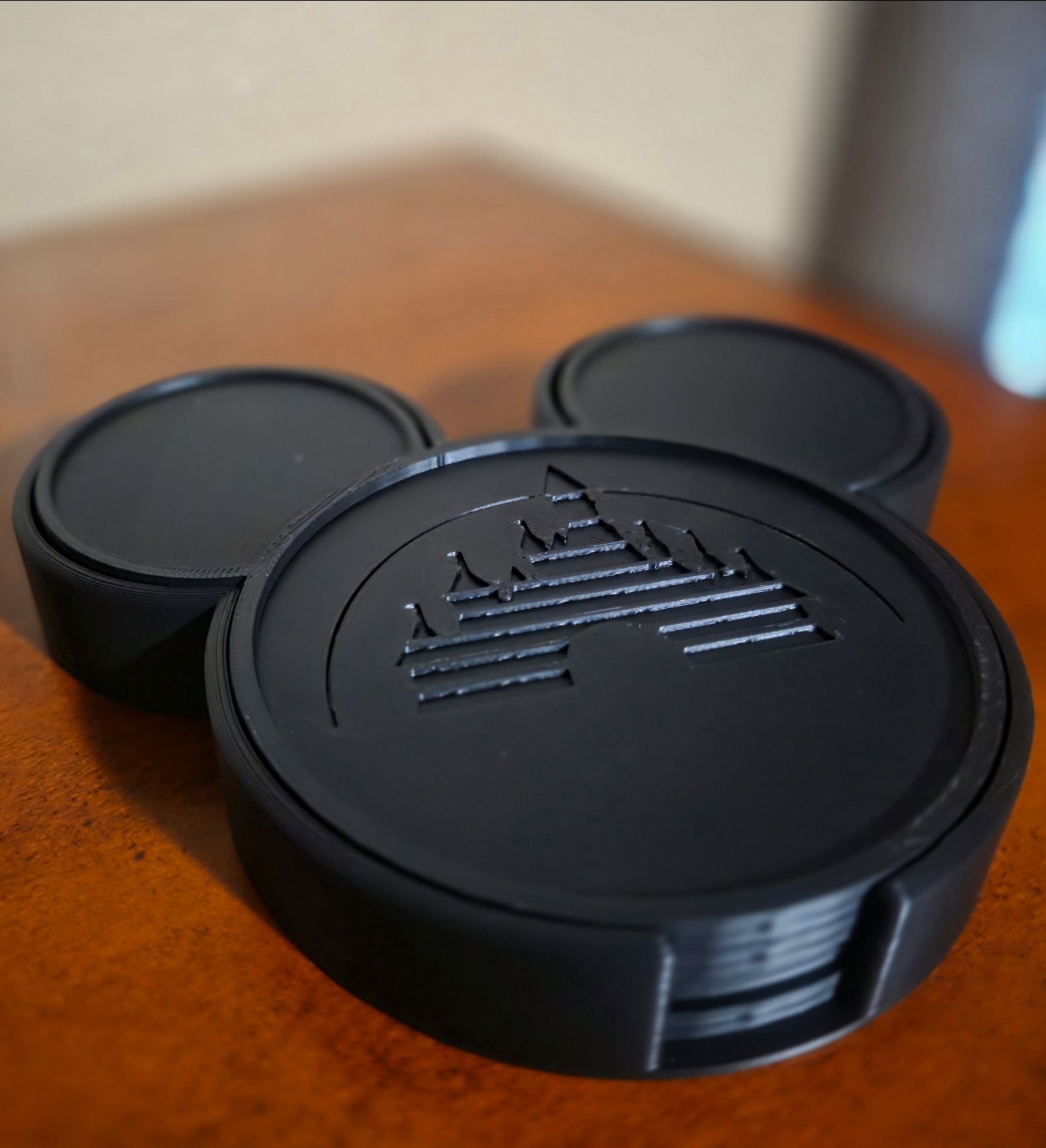 3D-Printed Mickey Mouse-Shaped Coasters With Embossed Disney Fantasyland Castle