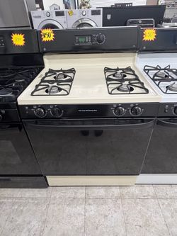 GE cream color gas stove