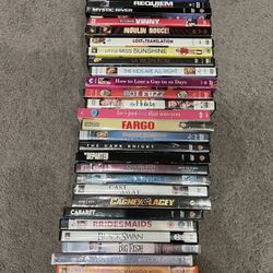 LOT OF 34 DVDs including a Full TV Season 1