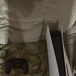 PlayStation 5 with 2 controllers and cords