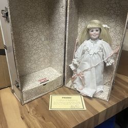 Vintage metal doll trunk with Seymour Mann included