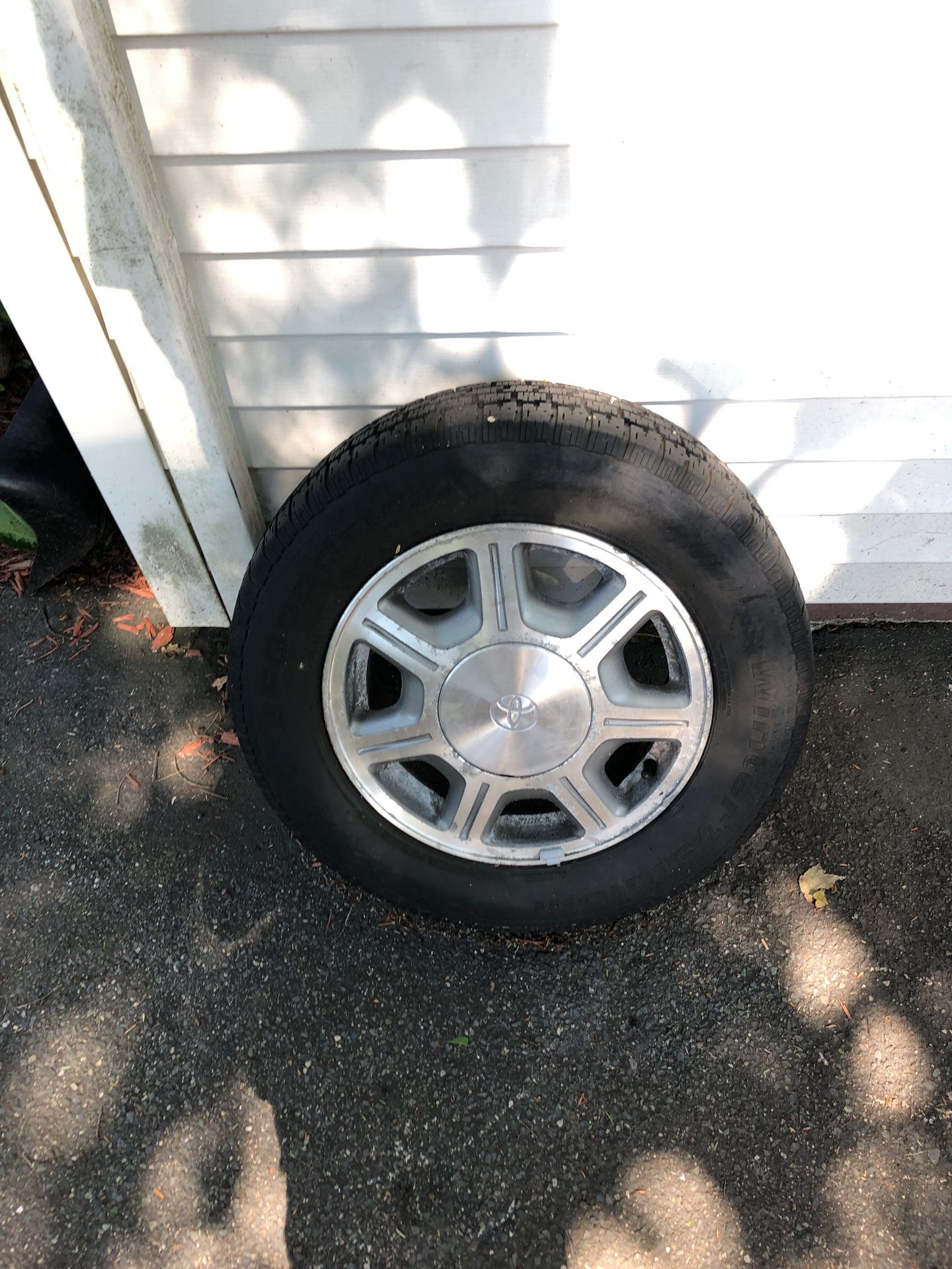 Two Toyota rims with good condition with Bridgestone winter tires