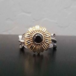 $2,600 At Camellia Handcrafted Sunflower Ring With Black Si1 Diamond.