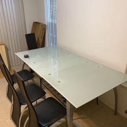 78” x 39” Glass Table With 4  Chairs 