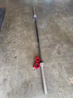 Olympic Barbell with Red Collar Clamps