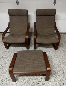 Two Ikea Poang chairs with cushions and 1 Footrest