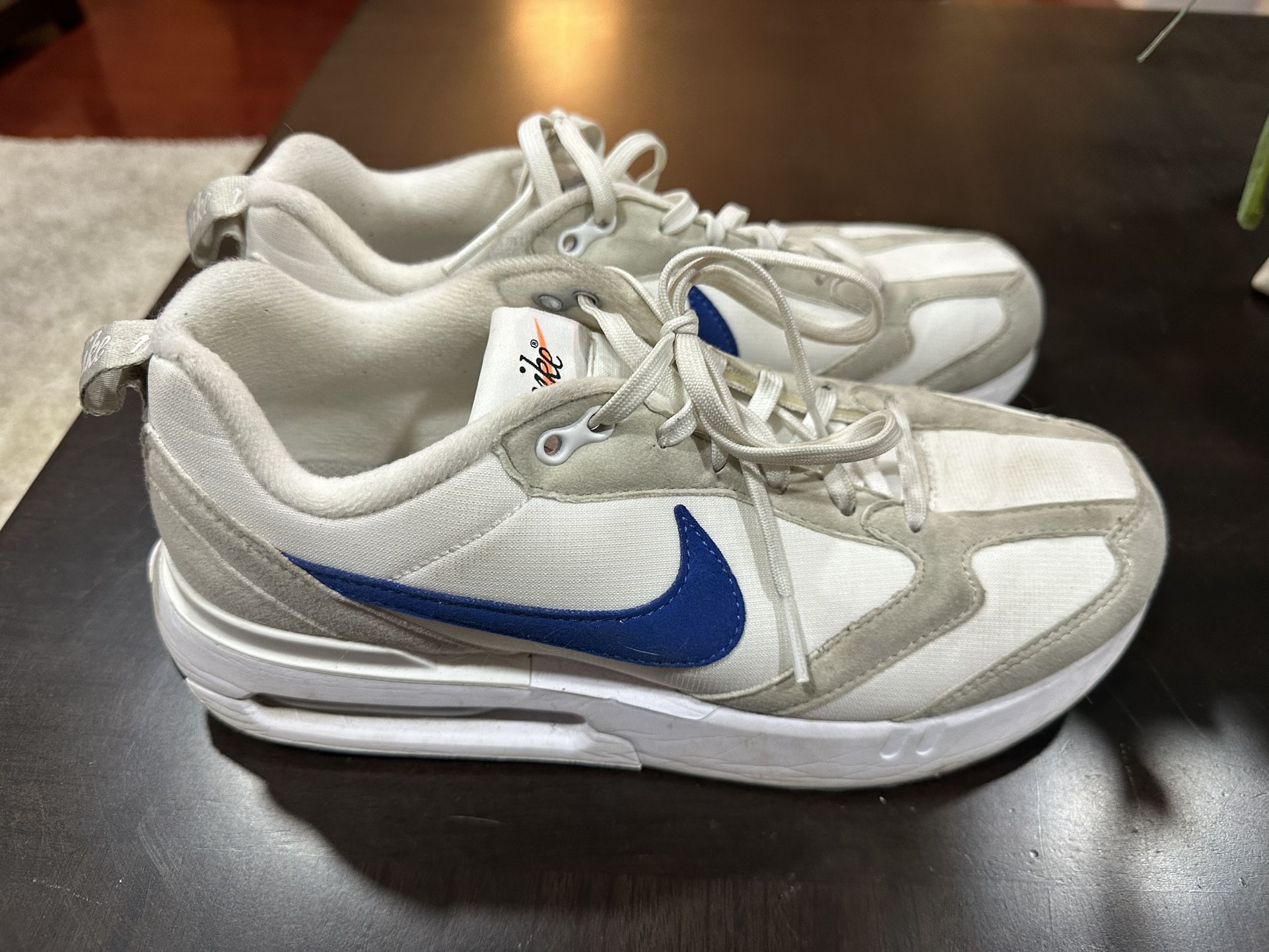 2 Nike Sneakers- White  ( adult Size 7)