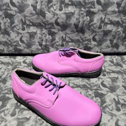 The dinkles Marching Band Shoes are stylish Oxford dress shoes in size 11, designed specifically for men. The pink color and synthetic upper material 