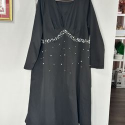 BRAND NEW BLACK WOMENS DRESS IN A 46” BUST SIZE WITH BEADED SEQUINS IN THE FRONT DESIGN