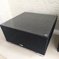 Outdoor black wicker coffee table with glass top