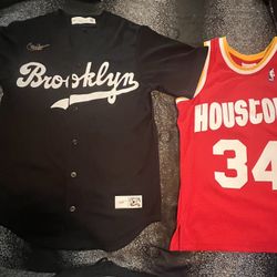 Brooklyn, Jackie Robinson baseball jersey/Houston Rockets Hakeem Olajuwon basketball jersey
