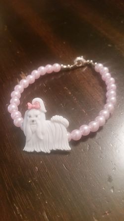 Pink and white dog bracelet