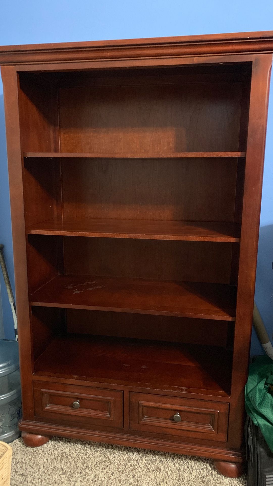 Shelving with two drawers for storage at the bottom. Good condition has a few scratches.