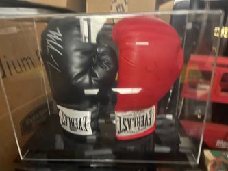 Mike Tyson(Black) and Conor Mcgregor(Red) Autographed Boxing Gloves