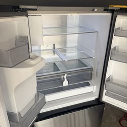 Samsung 32 Cu Ft French Door Refrigerator - Dual Ice Maker - 2 Years old