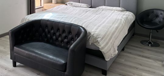 Black sofa with 2 matching swivel chairs