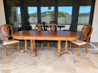 Large Dining Table with extension And 4 matching padded chairs