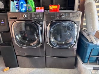 LG Front-Load Washer and Dryer Set with Pedestals