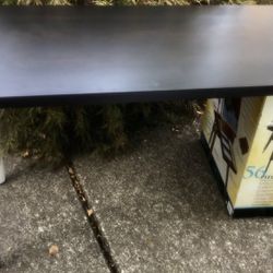 Ikea two legged table for use with file cabinet