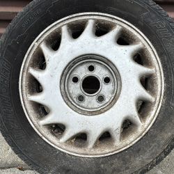 One Lexus LS400 15x5.5 inch aluminum wheel 5 on 4.5 inches