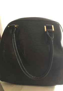 Louis Vuitton handbag with matching wallet