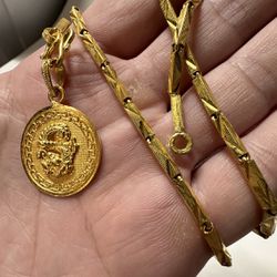 23 karat Gold chain / pendant 