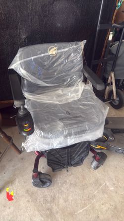 Silla de ruedas. Electrica.  Con cargador