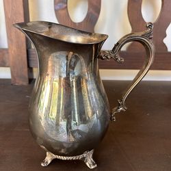 Silver water pitcher