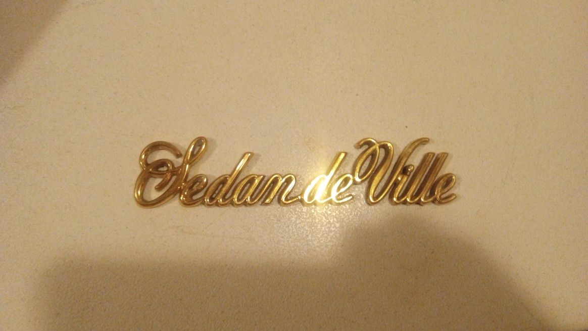 Cadillac Emblem Plastic Gold Tone