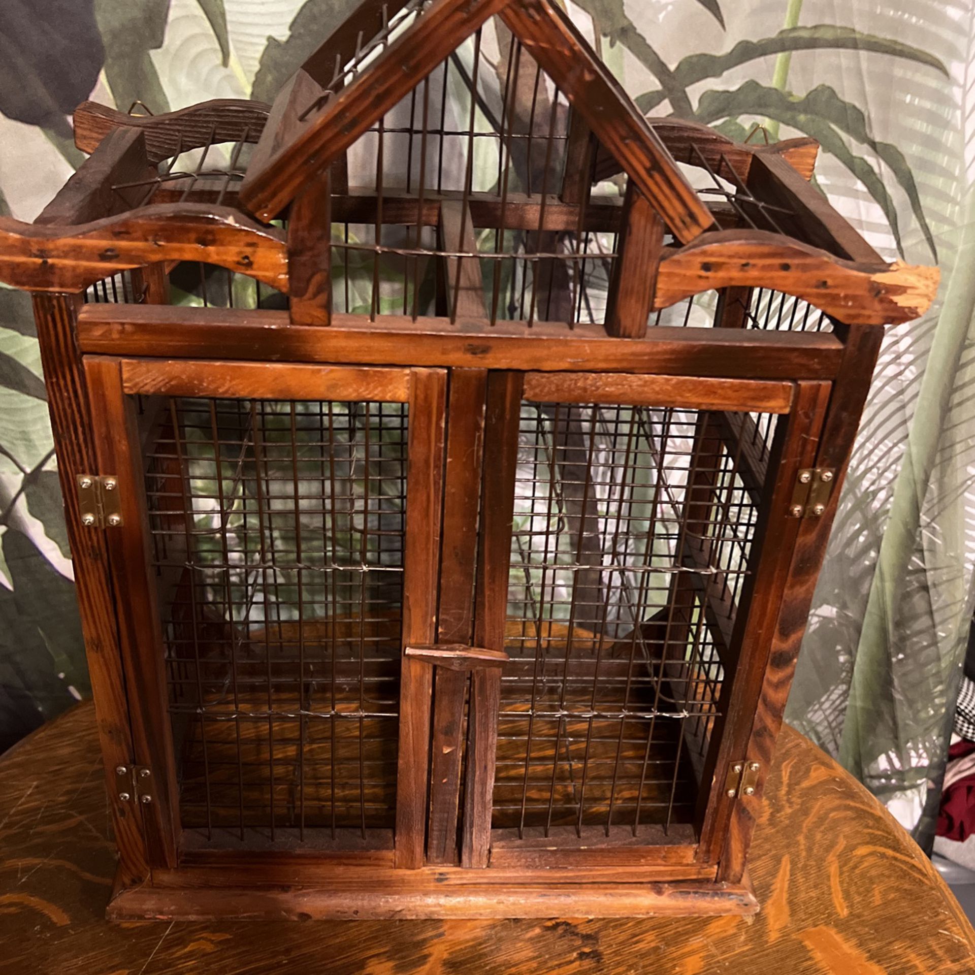 BIRD OR PET-CAGE SOLID WOOD HANDMADE BOUGHT AT ANTIQUE DEALER IN LONDON ITS 100YRS OLD! CAN HANG ON WALL OR ON A HOOK HAS BOTH KIND OF HOOKS TO HANG