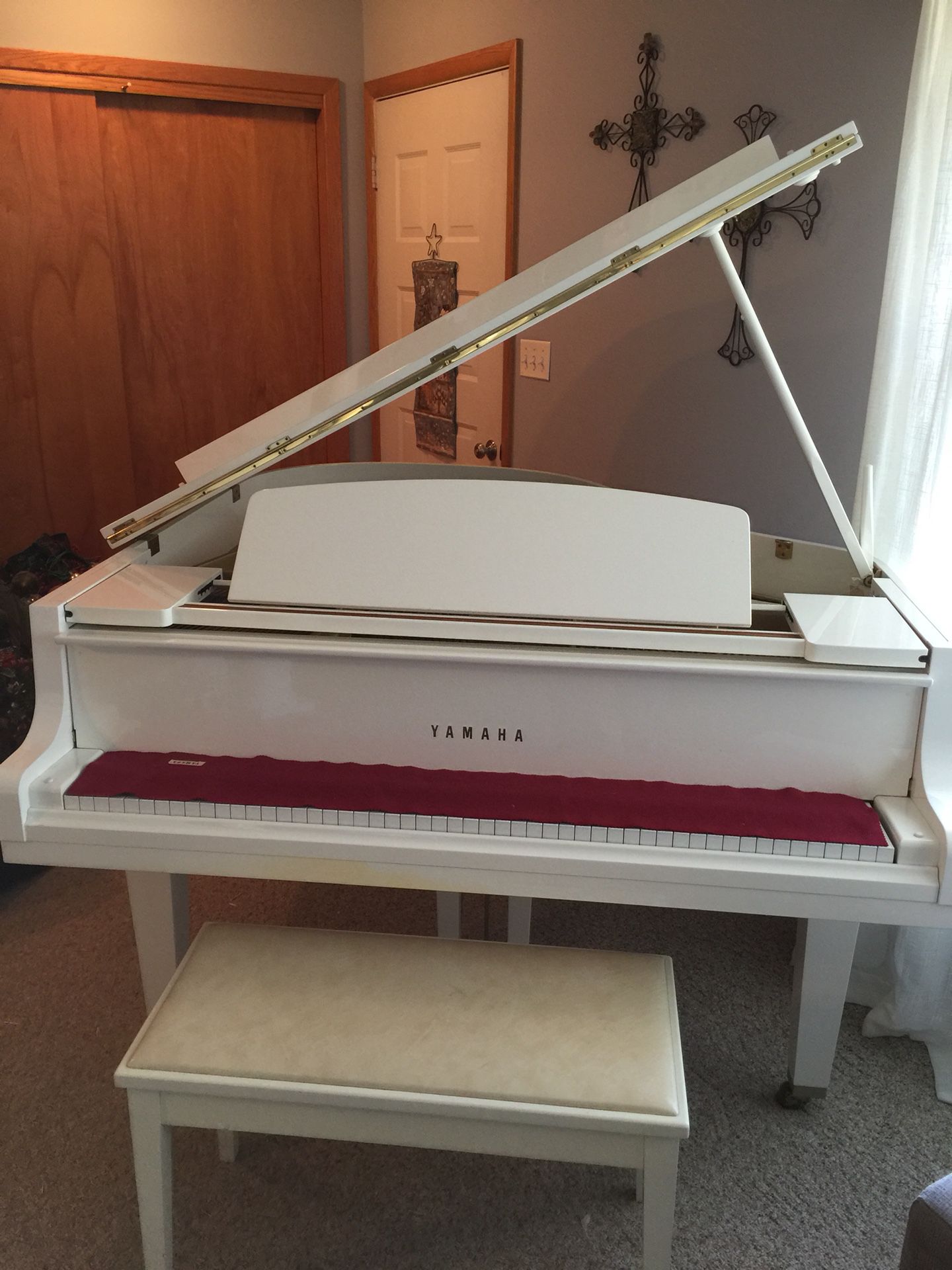 Yamaha white baby grand piano