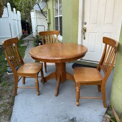 Round-oval Three Chairs Small Nook Wooden Table.