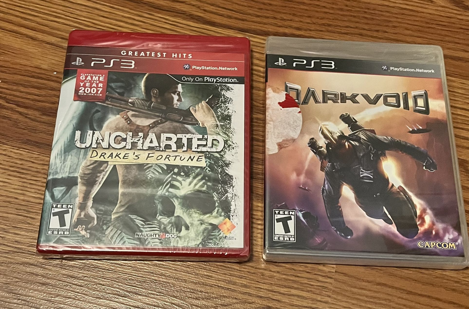 PS3 Games : Uncharted Drake’s Fortune &  Dark Void both these games are NEW AND SEALED.