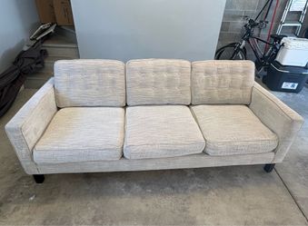 Grey couch with dark grey pattern