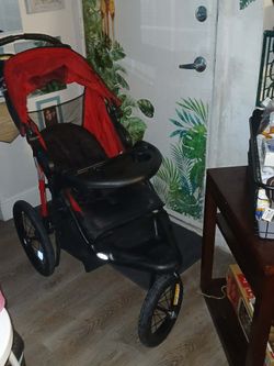 Red jogger stroller