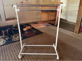 Portable closet and pool towel holder
