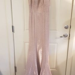 Size Medium. Gorgeous Formal dress. Perfect condition. Worn once for prom.
