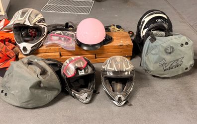 Motorcycle helmets, different sizes with bags and goggles