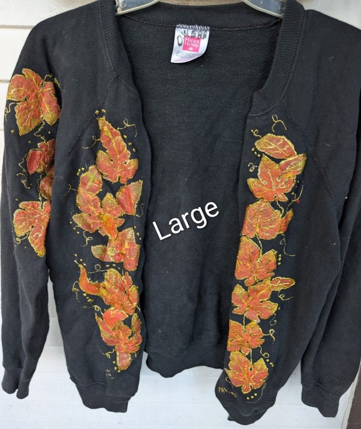 Womens Black Sweater With Orange Fall Leaves Trimmed In Gold Size Large 12-14 By Hanes. East Or West
(Sweatshirt Material) Not Made To Button. 50% Cot